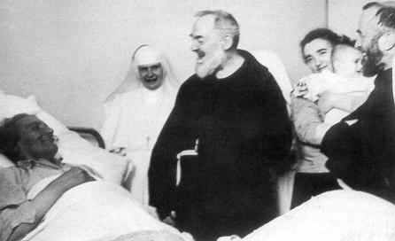 A group of nuns and an old man in a hospital.