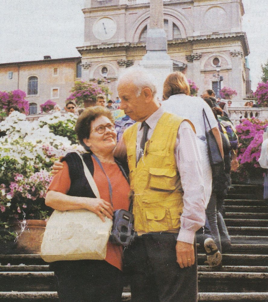 A man and woman standing next to each other.