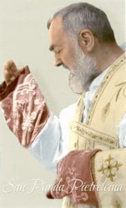 A man in a red and white outfit holding his hands up.