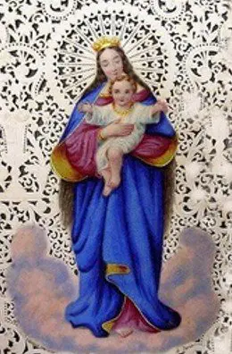 A statue of mary holding jesus in her arms.