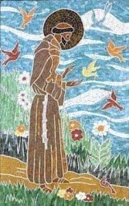 A mosaic of st francis with birds flying around him.