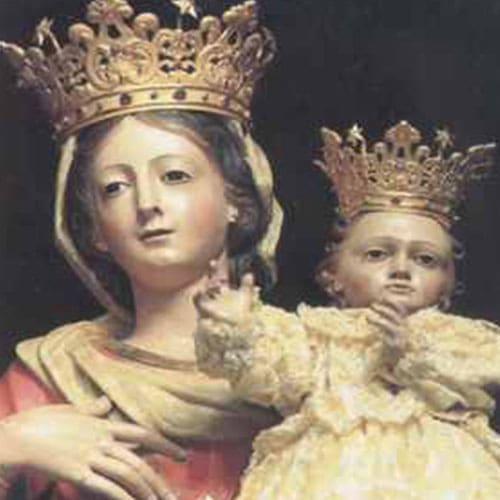 A painting of mary holding the baby jesus.