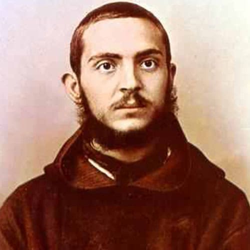 A man in brown robe and beard with mustache.