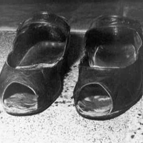 A pair of shoes that are on the ground.