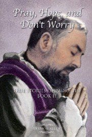 A man with beard and purple scarf praying.