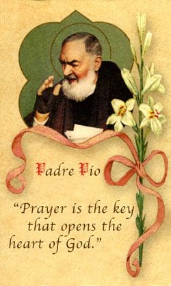 A picture of padre pio with the words " prayer is the key that opens the door to all."