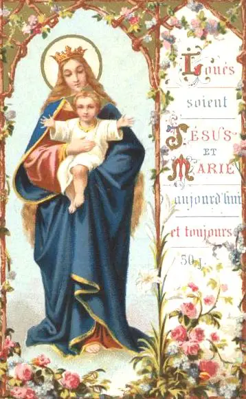 Mary holding baby Jesus with flowers.