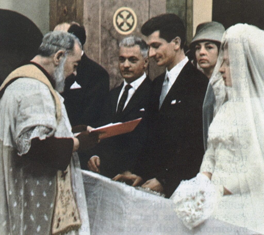 Wedding ceremony with priest and couple.
