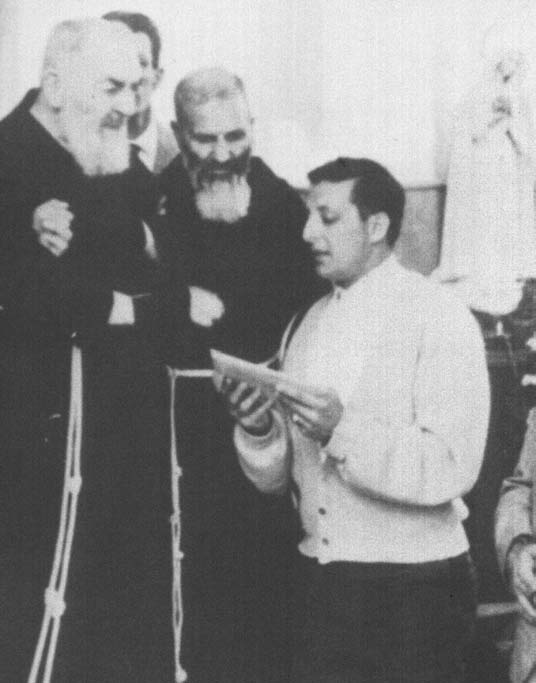 Clergy members listening to a speaker.