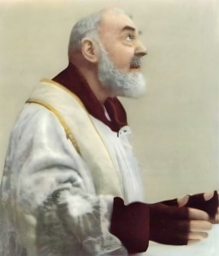 Elderly man in religious attire praying.