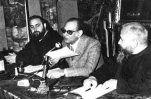 A blue and white facebook logo with black background