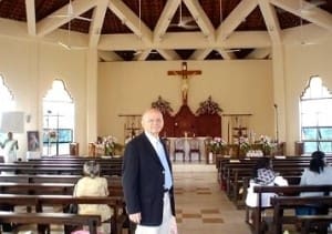 A blue and white facebook logo with black background