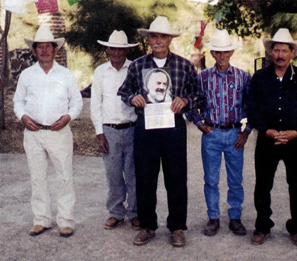 A blue and white facebook logo with black background