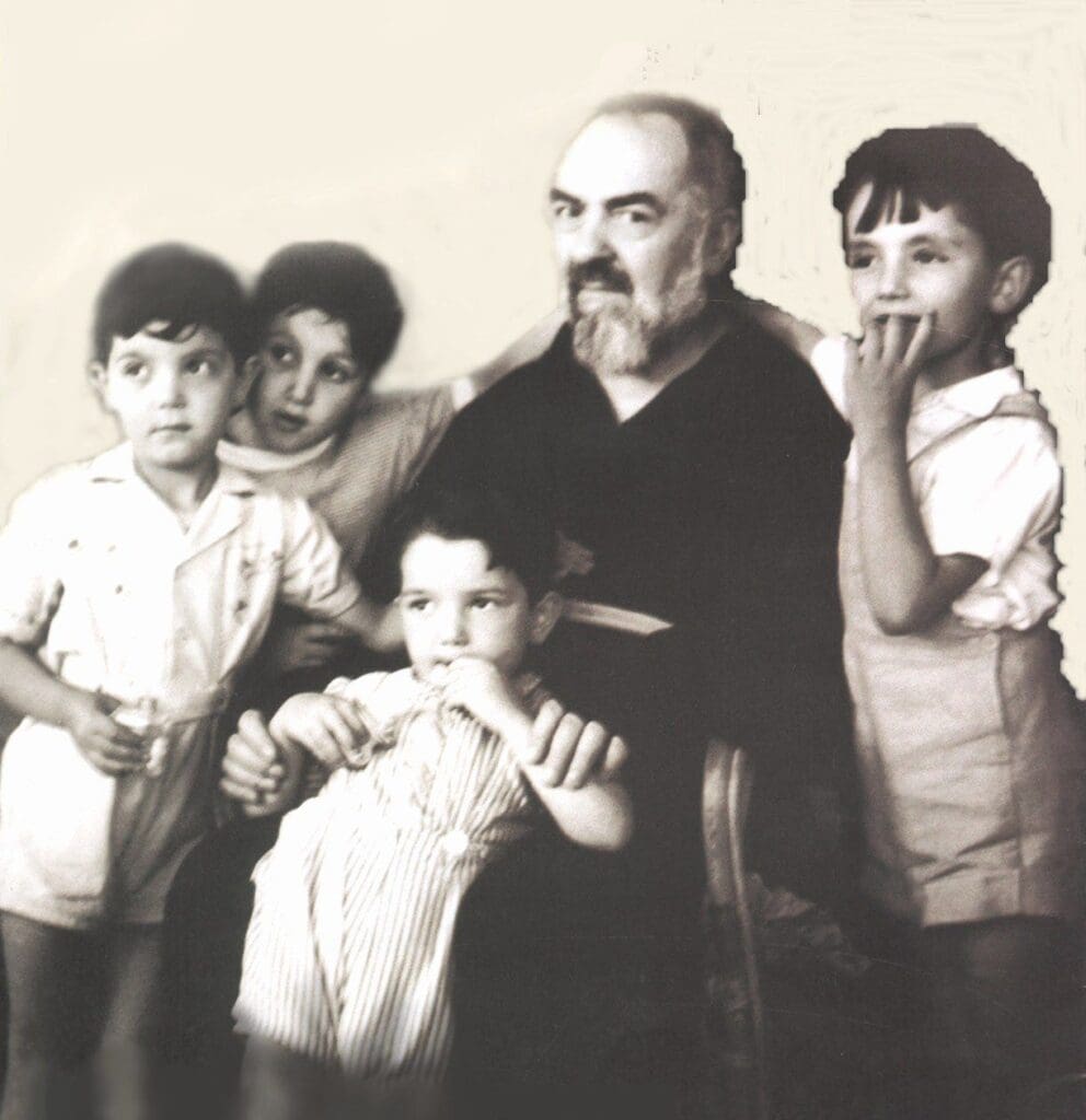 Older man with four young children.