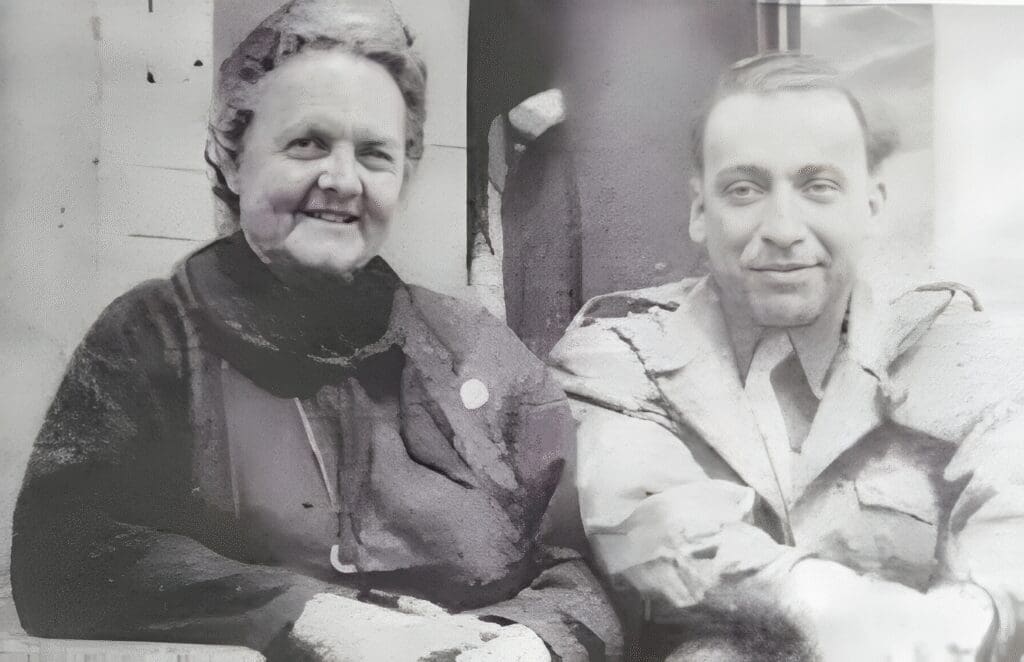 Smiling woman and man in vintage attire.