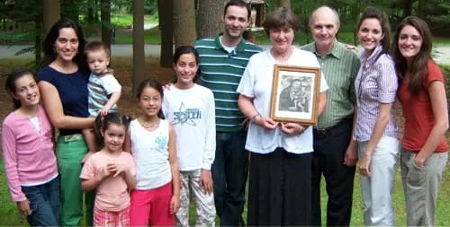Ortrud and Germain Bianchi with the wedding picture given to them by Padre Pio