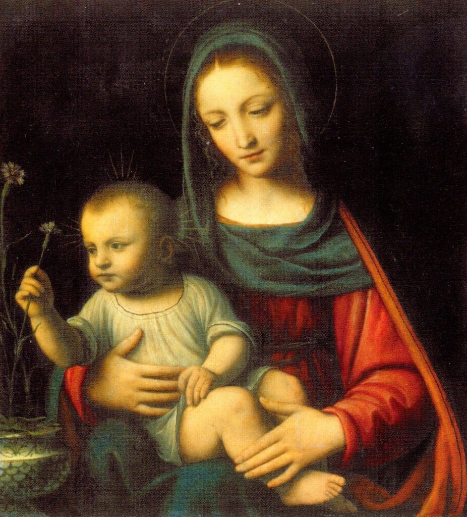 Mother and child with a flower.